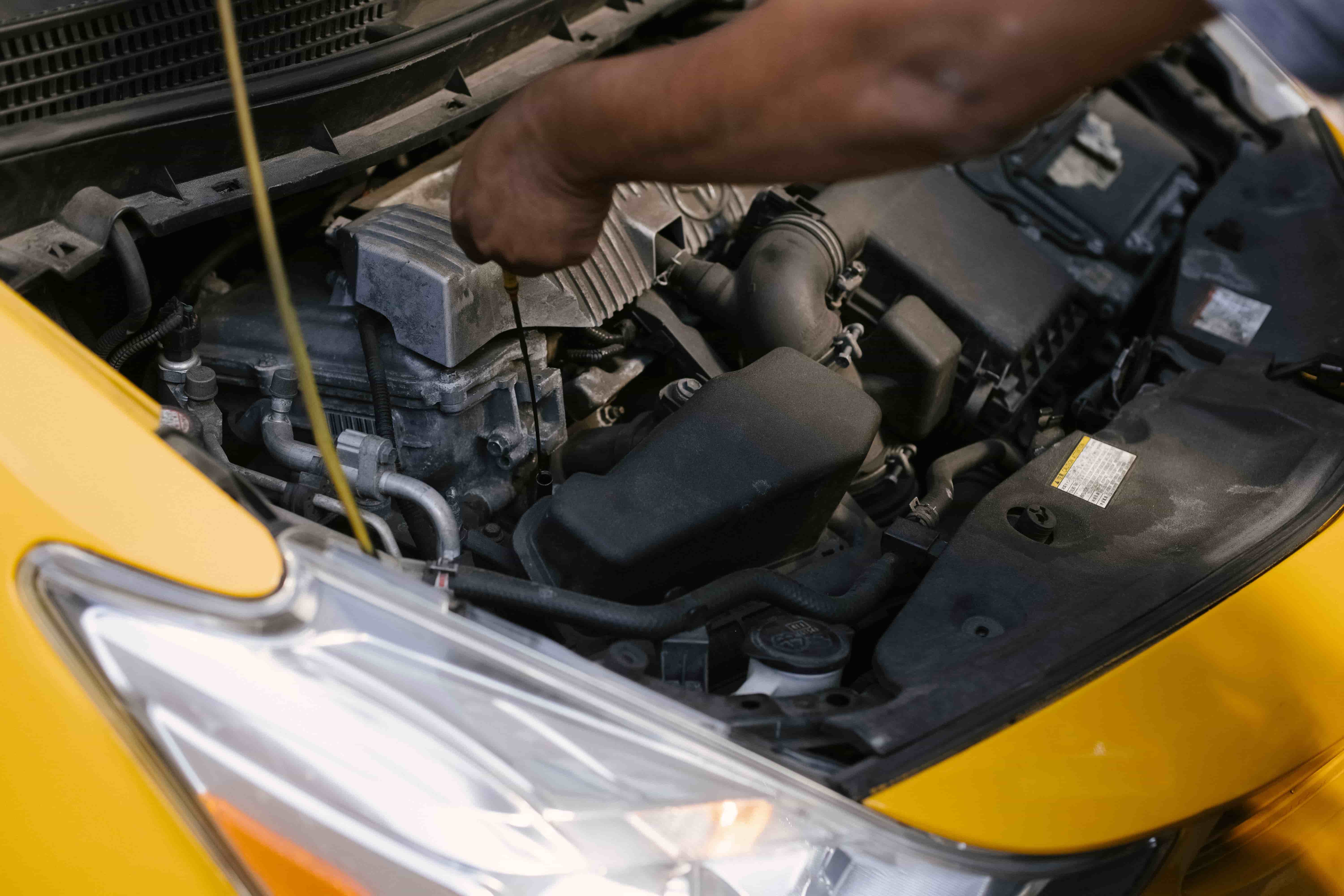Used car inspection with hood open before a private sale in Clarksville